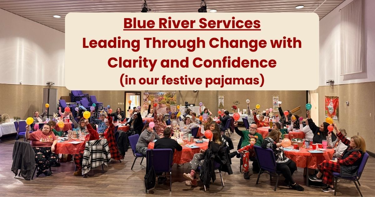 Amy Waninger poses with leaders of the CREW Tampa Bay Chapter in front of their logo