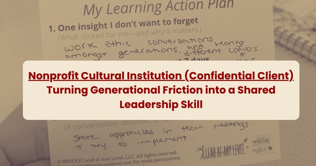 A workshop participant holds up a completed "My Learning Action Plan" card with handwritten notes on what they learned and how they plan to apply it.