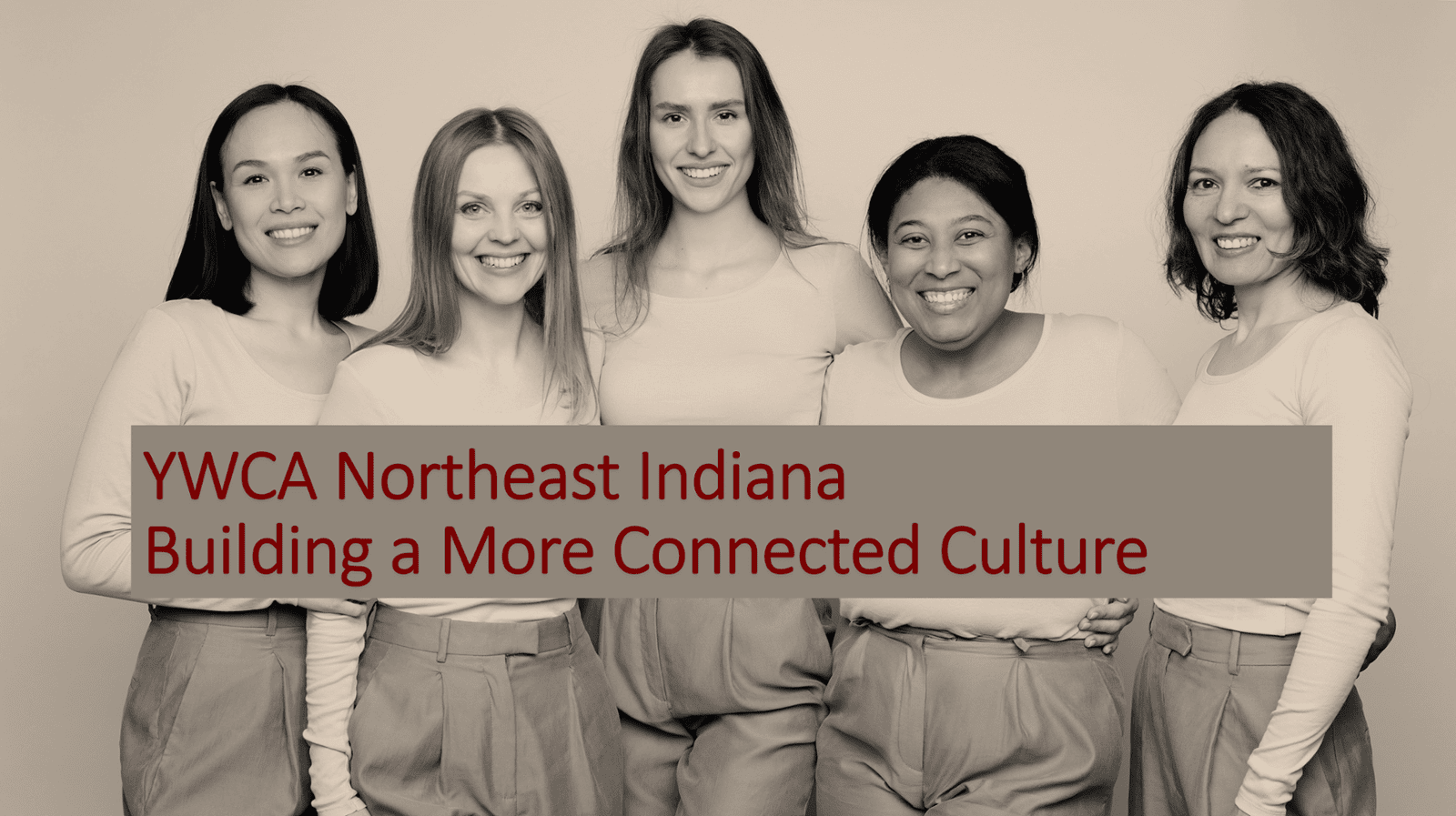 a diverse group of women stand shoulder-to-shoulder